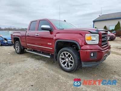 Czwarte zdjęcie samochodu z boku: 2015 GMC SIERRA K1500 SLT VIN:1GTV2VEC2FZ383217 - miniatura