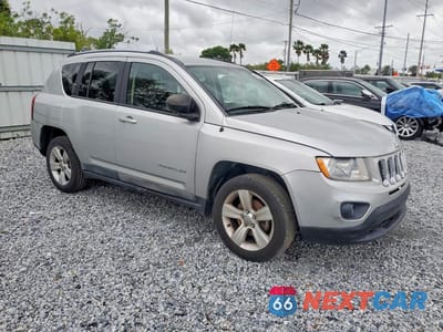 Czwarte zdjęcie samochodu z boku: 2011 JEEP COMPASS SPORT VIN:1J4NT1FAXBD138864 - miniatura