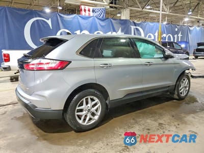 Trzecie zdjęcie samochodu z tyłu: 2023 FORD EDGE SEL VIN:2FMPK4J9XPBA26400 - miniatura
