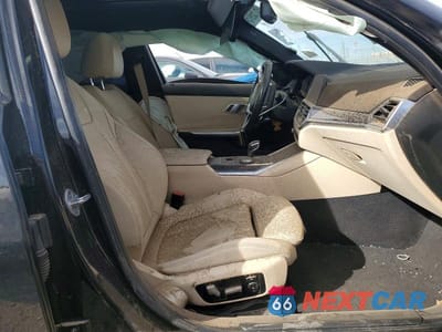 Zdjęcie 7 z 11 samochodu: 2021 BMW 330I VIN:3MW5R1J00M8B59464 - miniatura