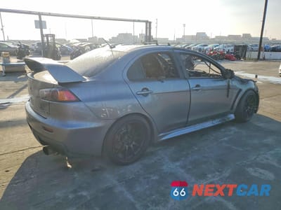 Trzecie zdjęcie samochodu z tyłu: 2015 MITSUBISHI LANCER EVOLUTION GSR VIN:JA32W8FV4FU026450 - miniatura