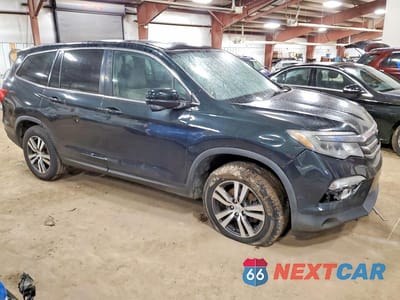 Czwarte zdjęcie samochodu z boku: 2016 HONDA PILOT EXL VIN:5FNYF6H5XGB045298 - miniatura