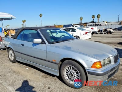 Czwarte zdjęcie samochodu z boku: 1998 BMW 323 IC AUTOMATIC VIN:WBABJ8322WEM21289 - miniatura