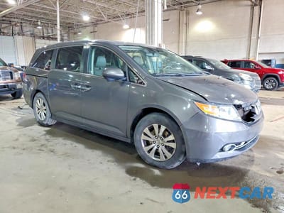 Czwarte zdjęcie samochodu z boku: 2014 HONDA ODYSSEY EXL VIN:5FNRL5H69EB120490 - miniatura