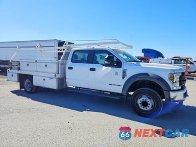 Czwarte zdjęcie samochodu z boku: 2019 FORD F450 SUPER DUTY FLATBED TRUCK VIN:1FD0W4GT6KEG81255 - miniatura