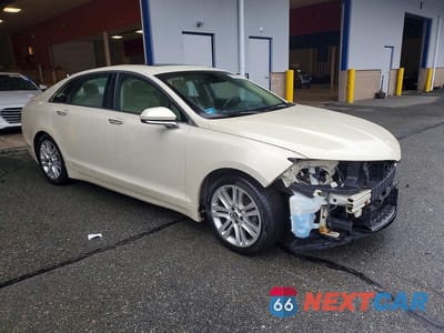 Czwarte zdjęcie samochodu z boku: 2014 LINCOLN MKZ HYBRID VIN:3LN6L2LU4ER803263 - miniatura