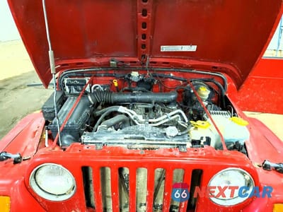 Zdjęcie 12 z 14 samochodu: 2003 JEEP WRANGLER COMMANDO VIN:1J4FA39S63P360778 - miniatura