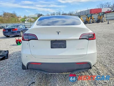 Zdjęcie 6 z 11 samochodu: 2023 TESLA MODEL Y VIN:7SAYGDEF7PA048965 - miniatura