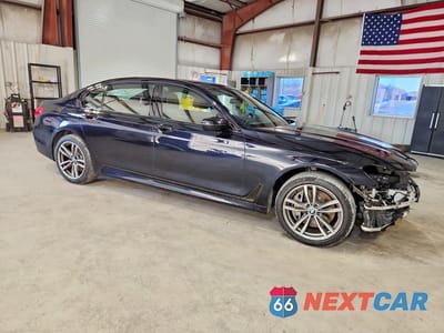 Czwarte zdjęcie samochodu z boku: 2018 BMW 750 XI VIN:WBA7F2C58JG424130 - miniatura