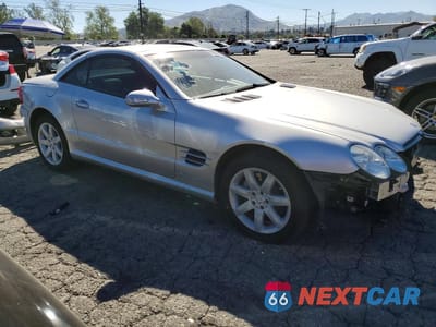 Czwarte zdjęcie samochodu z boku: 2003 MERCEDES-BENZ SL 500R VIN:WDBSK75F73F060432 - miniatura