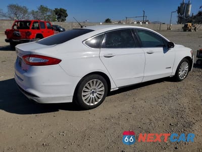 Trzecie zdjęcie samochodu z tyłu: 2016 FORD FUSION SE HYBRID VIN:3FA6P0LU9GR389354 - miniatura