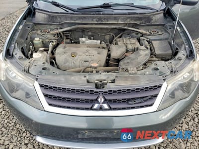 Zdjęcie 12 z 13 samochodu: 2009 MITSUBISHI OUTLANDER SE VIN:JA4MT31W39Z005936 - miniatura