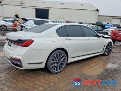 Trzecie zdjęcie samochodu z tyłu: 2022 BMW 750 XI VIN:WBA7U2C01NCH00982 - miniatura