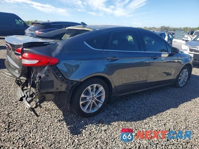 Trzecie zdjęcie samochodu z tyłu: 2020 FORD FUSION SE VIN:3FA6P0LU6LR266654 - miniatura