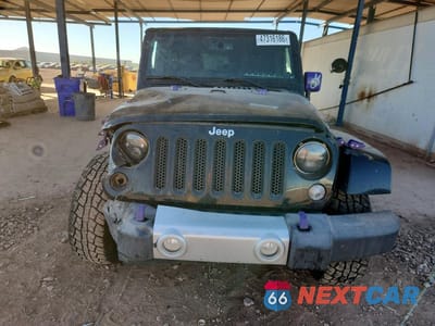 Piąte zdjęcie samochodu w środku: 2014 JEEP WRANGLER UNLIMITED SAHARA VIN:1C4BJWEG1EL175250 - miniatura