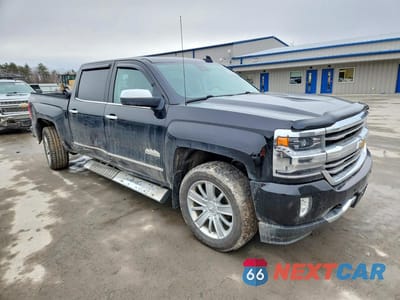 Czwarte zdjęcie samochodu z boku: 2017 CHEVROLET SILVERADO K1500 HIGH COUNTRY VIN:3GCUKTEC5HG272809 - miniatura
