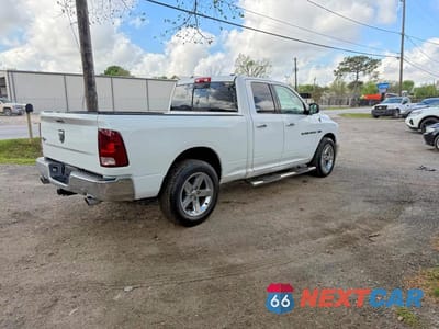 Czwarte zdjęcie samochodu z boku: 2012 DODGE RAM 1500 SLT VIN:1C6RD6GTXCS306461 - miniatura