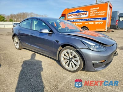 Czwarte zdjęcie samochodu z boku: 2023 TESLA MODEL 3 VIN:5YJ3E1EA7PF436880 - miniatura