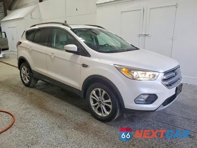 Czwarte zdjęcie samochodu z boku: 2017 FORD ESCAPE SE VIN:1FMCU9GD5HUF00850 - miniatura
