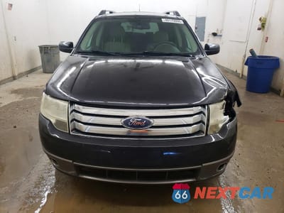 Piąte zdjęcie samochodu w środku: 2008 FORD TAURUS X SEL VIN:1FMDK02WX8GA10501 - miniatura