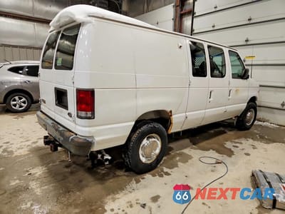 Trzecie zdjęcie samochodu z tyłu: 2000 FORD ECONOLINE E350 SUPER DUTY VAN VIN:1FTSE34L0YHB61705 - miniatura