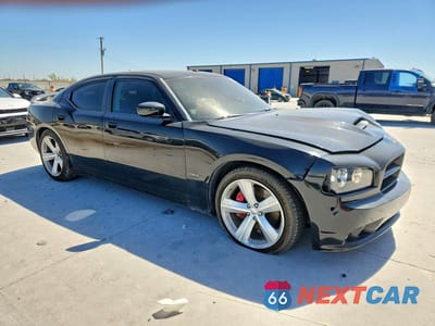 Czwarte zdjęcie samochodu z boku: 2008 DODGE CHARGER SRT-8 VIN:2B3LA73W28H271136 - miniatura