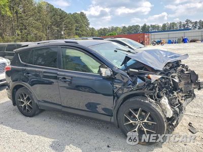 Czwarte zdjęcie samochodu z boku: 2018 TOYOTA RAV4 HYBRID SE VIN:JTMJJREVXJD215308 - miniatura