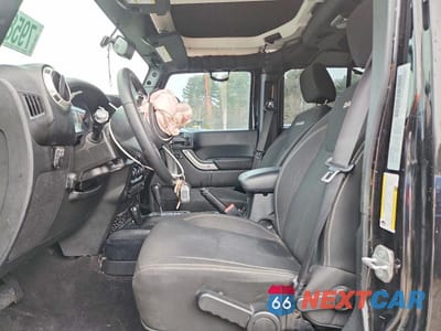 Zdjęcie 7 z 13 samochodu: 2016 JEEP WRANGLER UNLIMITED SAHARA VIN:1C4BJWEG9GL347155 - miniatura