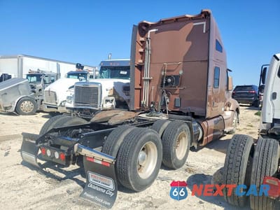 Czwarte zdjęcie samochodu z boku: 2016 KENWORTH CONSTRUCTION T680 VIN:1XKYDP9X4GJ492010 - miniatura