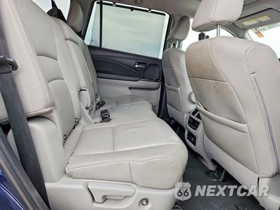 Zdjęcie 11 z 13 samochodu: 2019 HONDA PILOT TOURING VIN:5FNYF6H97KB020791 - miniatura