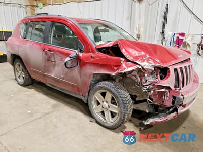 Czwarte zdjęcie samochodu z boku: 2010 JEEP COMPASS VIN:1J4NF4FB9AD601674 - miniatura