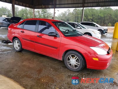 Czwarte zdjęcie samochodu z boku: 2001 FORD FOCUS 4D LX VIN:1FAFP34381W139776 - miniatura
