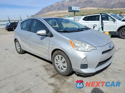 Czwarte zdjęcie samochodu z boku: 2012 TOYOTA PRIUS C TWO VIN:JTDKDTB34C1526975 - miniatura