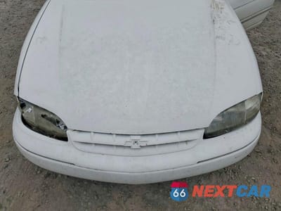Zdjęcie 11 z 11 samochodu: 2001 CHEVROLET LUMINA VIN:2G1WL52J611130724 - miniatura