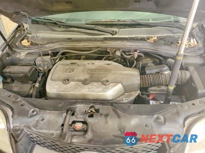 Zdjęcie 12 z 12 samochodu: 2004 ACURA MDX TOURING VIN:2HNYD18664H562065 - miniatura