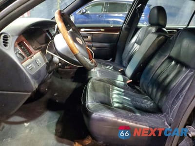 Zdjęcie 7 z 12 samochodu: 2003 LINCOLN TOWN CAR SIGNATURE VIN:1LNHM82W33Y632368 - miniatura