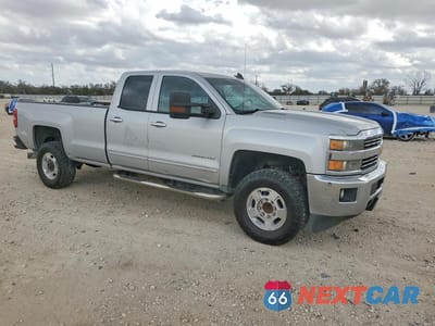 Czwarte zdjęcie samochodu z boku: 2015 CHEVROLET SILVERADO C2500 HEAVY DUTY LT VIN:1GC2CVE86FZ539514 - miniatura