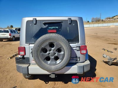 Zdjęcie 6 z 11 samochodu: 2014 JEEP WRANGLER SAHARA VIN:1C4AJWBG9EL175612 - miniatura