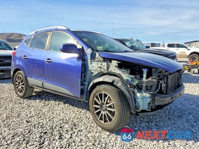 Czwarte zdjęcie samochodu z boku: 2011 HYUNDAI TUCSON GLS VIN:KM8JU3AC8BU155857 - miniatura