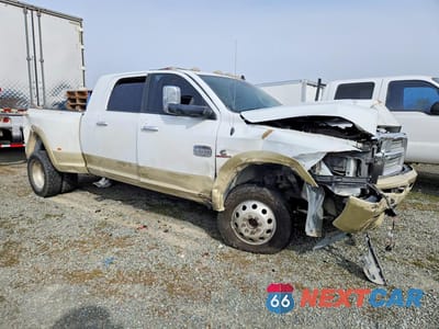 Czwarte zdjęcie samochodu z boku: 2015 RAM 3500 LONGHORN VIN:3C63RRNL8FG688187 - miniatura