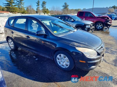 Czwarte zdjęcie samochodu z boku: 2010 HYUNDAI ELANTRA TOURING GLS VIN:KMHDB8AEXAU052939 - miniatura