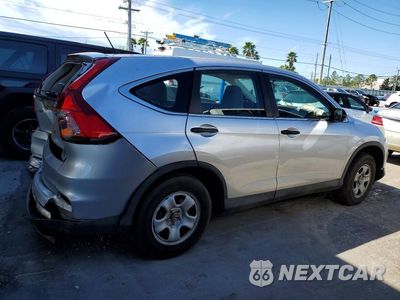 Trzecie zdjęcie samochodu z tyłu: 2016 HONDA CR-V LX VIN:2HKRM3H32GH506261 - miniatura