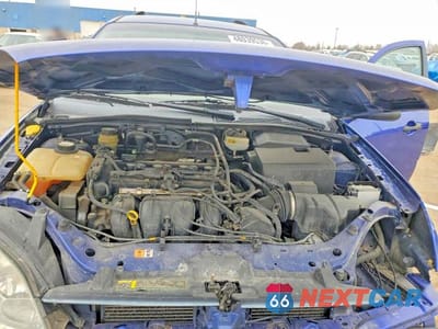 Zdjęcie 11 z 12 samochodu: 2005 FORD FOCUS ZXW VIN:1FAFP36N25W231518 - miniatura