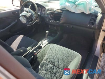 Zdjęcie 8 z 12 samochodu: 2002 HONDA CIVIC LX VIN:1HGEM22502L005863 - miniatura