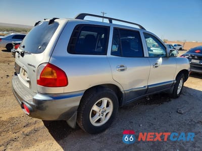 Trzecie zdjęcie samochodu z tyłu: 2002 HYUNDAI SANTA FE GLS VIN:KM8SC73D72U243965 - miniatura