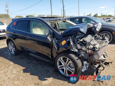 Czwarte zdjęcie samochodu z boku: 2016 FORD EDGE TITANIUM VIN:2FMPK4K84GBB84088 - miniatura