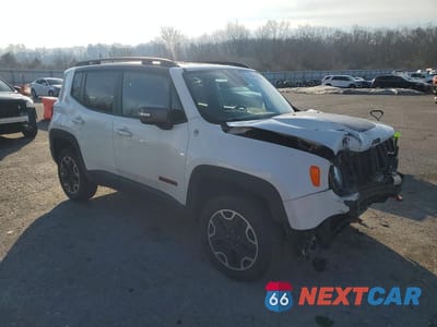 Czwarte zdjęcie samochodu z boku: 2016 JEEP RENEGADE TRAILHAWK VIN:ZACCJBCT0GPD32701 - miniatura
