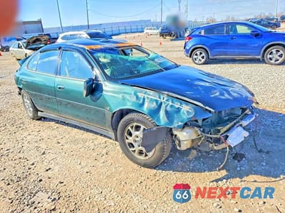 Czwarte zdjęcie samochodu z boku: 2000 OLDSMOBILE INTRIGUE GLS VIN:1G3WX52H3YF104495 - miniatura