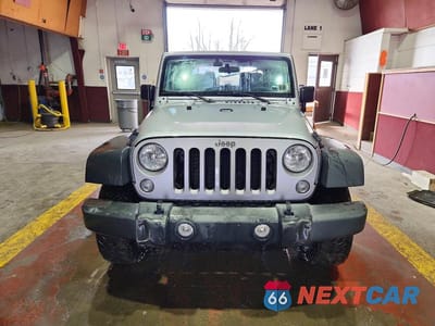 Piąte zdjęcie samochodu w środku: 2016 JEEP WRANGLER SPORT VIN:1C4AJWAG1GL181831 - miniatura