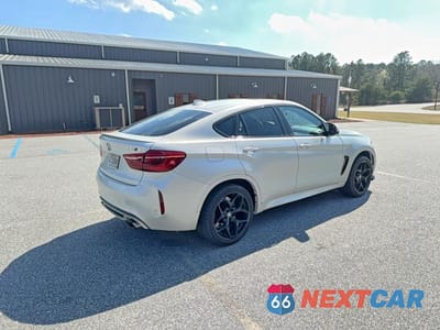 Czwarte zdjęcie samochodu z boku: 2017 BMW X6 M VIN:5YMKW8C30H0U72441 - miniatura